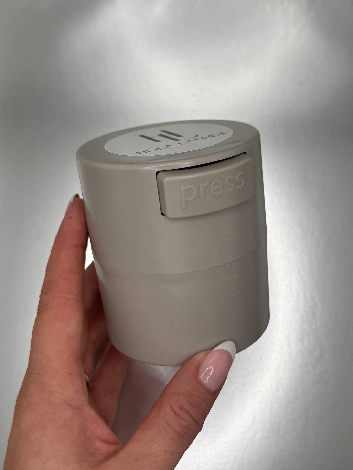 Adhesive Storage Container